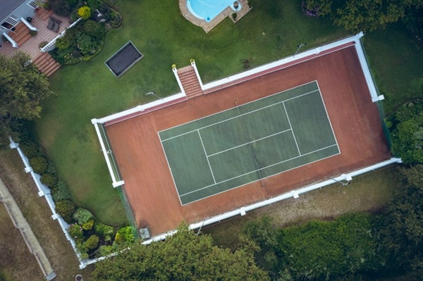 Navigating HOA Rules and City Permits for Backyard Courts in the Twin Cities